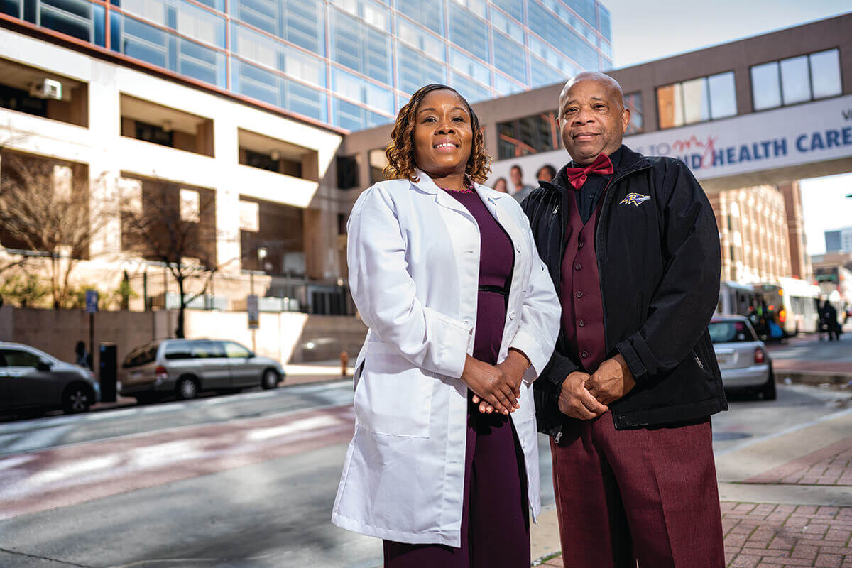 MeShondra Collins with veteran Anthony Washington, who received care in MeMe’s unit.