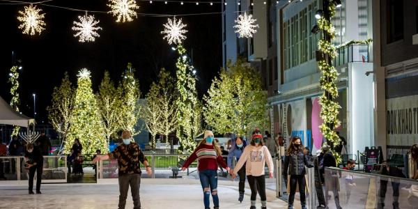 People Ice Skating at the Holidays