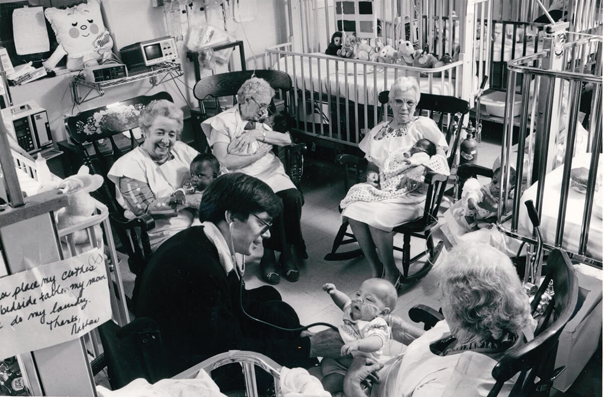 1987 Doctor Metz with _volunteer grandparents_ and patients_CMYK_B