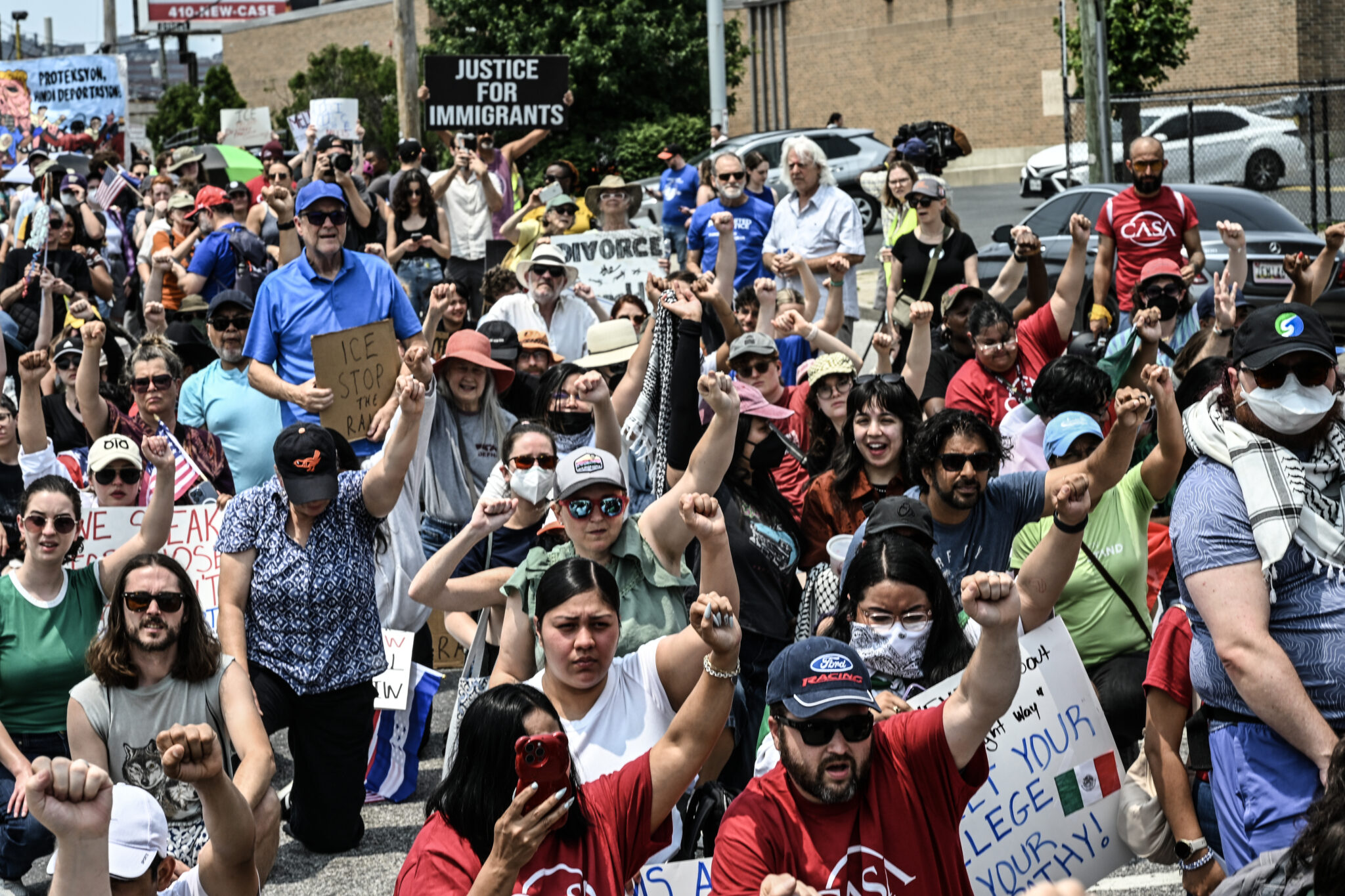 Photos: Hundreds Protest ICE Raids in Baltimore